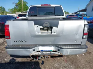 2010 Nissan Titan XE with VIN 1N6AA0EJ4AN311838, listed as a IAAI auction lot 41789366 with 208,900 mi miles. Bid and sale history available at carsss.com. Image 17.