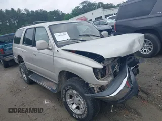 2000 Toyota 4Runner SR5 z VIN JT3GN86R1Y0139431, wystawiony jako IAAI lot #42103546 z przebiegiem 376 600 mil mil oraz . Historia ofert i sprzedaży dostępna na DreamBid. Obrazek 1.