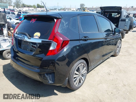 2015 Honda Fit EX-L z VIN 3HGGK5H85FM717646, wystawiony jako IAAI lot #42483387 z przebiegiem 137 296 mil mil oraz . Historia ofert i sprzedaży dostępna na DreamBid. Obrazek 4.