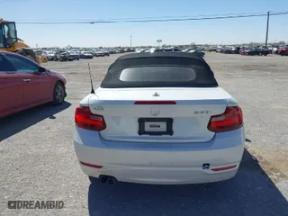 2015 BMW 2 Series 228i with VIN WBA1K5C50FV474011, listed as a IAAI auction lot 41805879 with 83,489 mi miles. Bid and sale history available at carsss.com. Image 15.