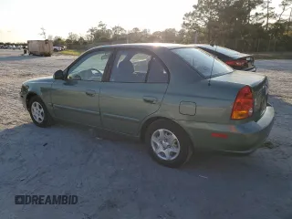 2005 Hyundai Accent GLS with VIN KMHCG45C35U595666, listed as a Copart auction lot 88294365 with 70,497 mi miles and Salvage Title. Bid and sale history available at carsss.com. Image 2.