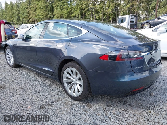 2017 Tesla Model S 100D with VIN 5YJSA1E27HF202563, listed as a IAAI auction lot 42460702 with 71,715 mi miles and . Bid and sale history available at DreamBid. Image 3.