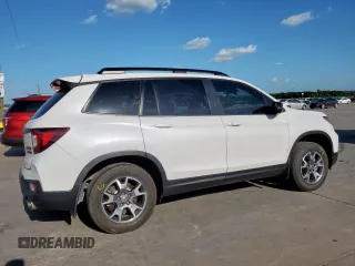 2023 Honda Passport TrailSport with VIN 5FNYF8H64PB007652, listed as a Copart auction lot 54064025 with 22,870 mi miles and Salvage title. Bid and sale history available at DreamBid. Image 3.