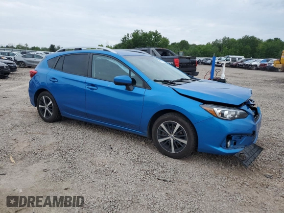 2022 Subaru Impreza Premium with VIN 4S3GTAV60N3711910, listed as a Copart auction lot 60787035 with 58,828 mi miles and Salvage title. Bid and sale history available at DreamBid. Image 4.