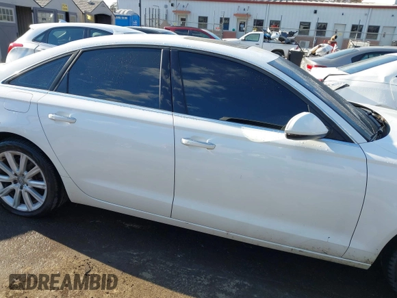 2015 Audi A6 2.0T Premium Plus with VIN WAUGFAFC6FN012134, listed as a IAAI auction lot 41363086 with 103,339 mi miles. Bid and sale history available at carsss.com. Image 13.