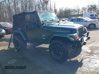 2003 Jeep Wrangler Sahara with VIN 1J4FA59S53P314998, listed as a IAAI auction lot 41734098 with 108,241 mi miles. Bid and sale history available at carsss.com. Image 1.