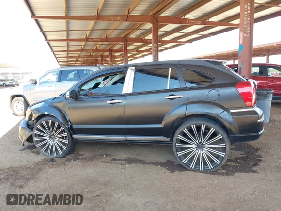 2010 Dodge Caliber SXT z VIN 1B3CB4HA3AD612829, wystawiony jako IAAI lot #42303635 z przebiegiem 230 191 mil mil oraz . Historia ofert i sprzedaży dostępna na DreamBid. Obrazek 13.