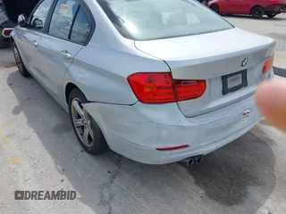 2013 BMW 3 Series 328i with VIN WBA3C1C59DK105001, listed as a IAAI auction lot 41923155 with 73,810 mi miles. Bid and sale history available at carsss.com. Image 3.