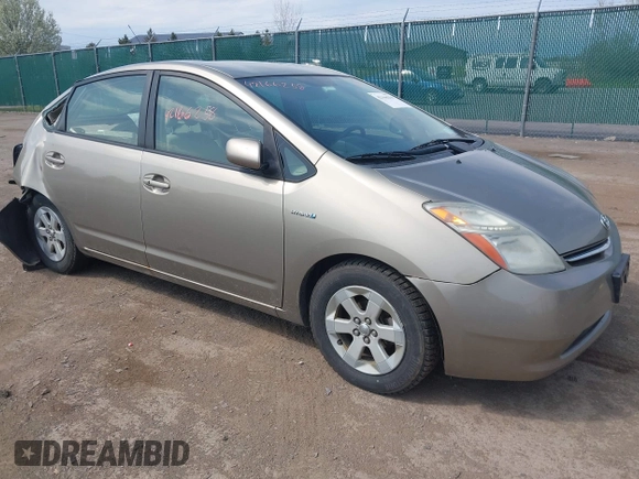 2007 Toyota Prius z VIN JTDKB20U073280948, wystawiony jako IAAI lot #42166258 z przebiegiem 236 628 mil mil oraz . Historia ofert i sprzedaży dostępna na DreamBid. Obrazek 1.