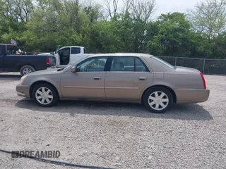 2006 Cadillac DTS 1SD z VIN 1G6KD57Y06U197794, wystawiony jako IAAI lot #42226706 z przebiegiem 135 748 mil mil oraz . Historia ofert i sprzedaży dostępna na DreamBid. Obrazek 14.