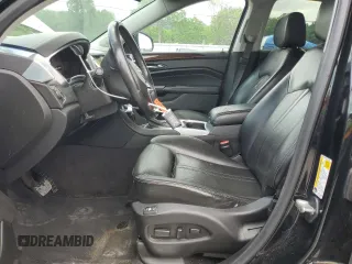 2014 Cadillac SRX Luxury Collection z VIN 3GYFNBE38ES527370, wystawiony jako Copart lot #55518735 z przebiegiem 141 379 mil mil oraz Szkoda całkowita • Salvage title. Historia ofert i sprzedaży dostępna na DreamBid. Obrazek 7.