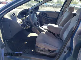 1999 Ford Taurus SE Standard with VIN 1FAFP58U9XG271897, listed as a Copart auction lot 73048784 with 190,518 mi miles and Salvage title. Bid and sale history available at DreamBid. Image 7.