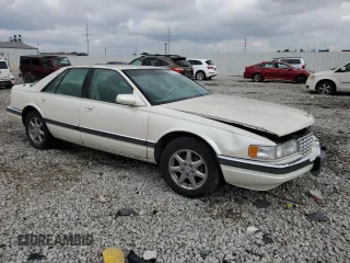 1995 Cadillac Seville Luxury SLS z VIN 1G6KS52Y7SU838169, wystawiony jako Copart lot #67941934 z przebiegiem 144 953 mil mil oraz Szkoda całkowita • Salvage title. Historia ofert i sprzedaży dostępna na DreamBid. Obrazek 4.