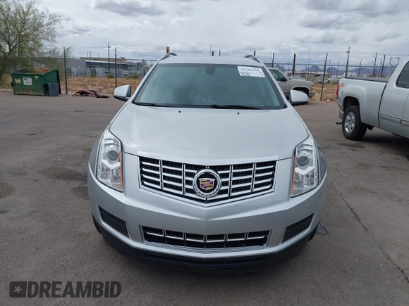 2015 Cadillac SRX with VIN 3GYFNAE34FS629258, listed as a IAAI auction lot 41788601 with 56,939 mi miles and . Bid and sale history available at DreamBid. Image 13.