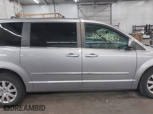 2013 Chrysler Town & Country Touring with VIN 2C4RC1BG9DR714736, listed as a IAAI auction lot 41824364 with 156,486 mi miles. Bid and sale history available at carsss.com. Image 14.