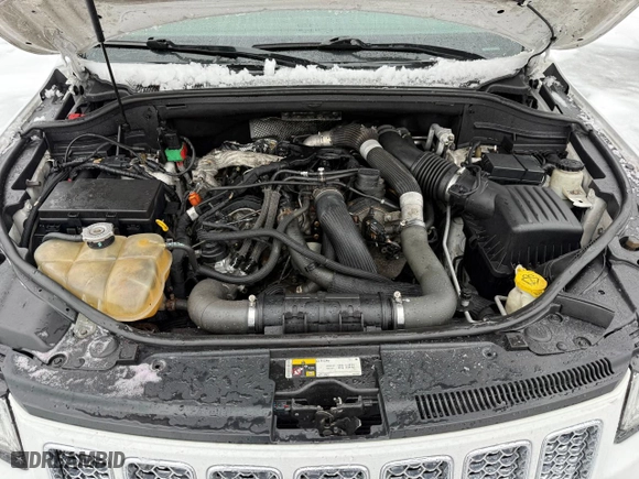 2014 Jeep Grand Cherokee Overland with VIN 1C4RJFCM1EC298621, listed as a Copart auction lot 50373995 with 142,491 mi miles and Clean Title. Bid and sale history available at carsss.com. Image 7.