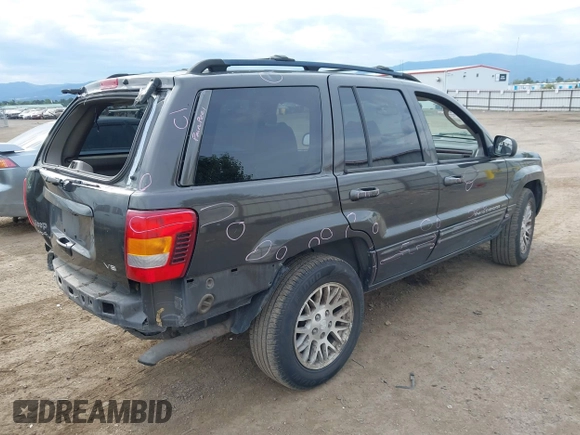 2004 Jeep Grand Cherokee Limited with VIN 1J4GW58N54C372118, listed as a IAAI auction lot 42526424 with 187,430 mi miles and . Bid and sale history available at DreamBid. Image 4.