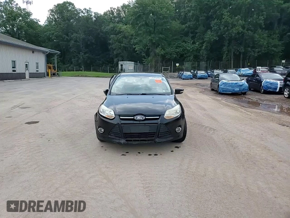 2013 Ford Focus SE with VIN 1FADP3F21DL348827, listed as a Copart auction lot 63589405 with 144,156 mi miles and Salvage title. Bid and sale history available at DreamBid. Image 13.