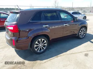 2014 Kia Sorento SX with VIN 5XYKW4A73EG458059, listed as a IAAI auction lot 41860159 with 140,644 mi miles. Bid and sale history available at carsss.com. Image 4.