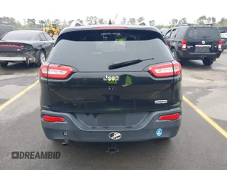 2015 Jeep Cherokee Latitude with VIN 1C4PJLCB9FW737360, listed as a IAAI auction lot 41939681 with 226,603 mi miles and . Bid and sale history available at carsss.com. Image 16.