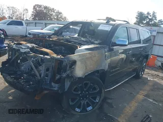 2017 Chevrolet Suburban Premier with VIN 1GNSKJKC6HR225604, listed as a IAAI auction lot 40962301 with Not Provided miles and . Bid and sale history available at DreamBid. Image 2.