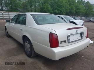 2003 Cadillac DeVille with VIN 1G6KD54Y93U179035, listed as a IAAI auction lot 42114653 with 112,591 mi miles. Bid and sale history available at carsss.com. Image 3.