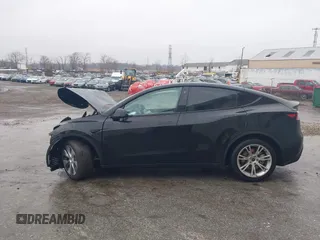2021 Tesla Model Y Standard Range with VIN 5YJYGDED9MF103989, listed as a IAAI auction lot 41482268 with 33,485 mi miles and . Bid and sale history available at DreamBid. Image 15.