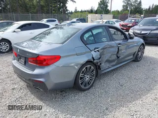 2018 BMW 5 Series 540i z VIN WBAJE5C54JG917877, wystawiony jako IAAI lot #42235433 z przebiegiem 103 375 mil mil oraz . Historia ofert i sprzedaży dostępna na DreamBid. Obrazek 4.