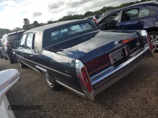 1989 Cadillac Brougham z VIN 1G6DW51Y6KR723841, wystawiony jako Copart lot #74548864 z przebiegiem 74 705 mil mil oraz Szkody całkowita. Historia ofert i sprzedaży dostępna na DreamBid. Obrazek 2.