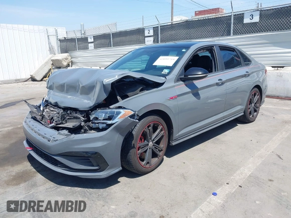 2019 Volkswagen Jetta GLI S z VIN 3VW6T7BU9KM153175, wystawiony jako IAAI lot #42099719 z przebiegiem 90 608 mil mil oraz . Historia ofert i sprzedaży dostępna na DreamBid. Obrazek 17.