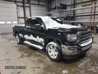 2019 GMC Sierra 1500 SLE z VIN 2GTV2MEC6K1126798, wystawiony jako IAAI lot #41333155 z przebiegiem 51 387 mil mil oraz . Historia ofert i sprzedaży dostępna na DreamBid. Obrazek 1.