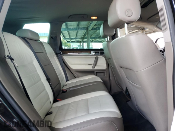 2010 Volkswagen Touareg VR6 with VIN WVGBF7A98AD001321, listed as a Copart auction lot 48949685 with 101,944 mi miles and Salvage Title. Bid and sale history available at DreamBid. Image 10.