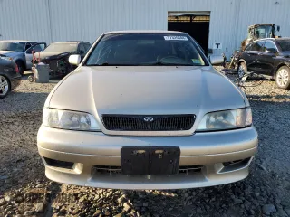 2002 Infiniti G20 Luxury z VIN JNKCP11A72T507242, wystawiony jako Copart lot #77325544 z przebiegiem 172 351 mil mil oraz Szkody całkowita. Historia ofert i sprzedaży dostępna na DreamBid. Obrazek 5.