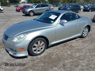 2005 Lexus SC 430 z VIN JTHFN48Y450071558, wystawiony jako IAAI lot #41939636 z przebiegiem 158 402 mil mil oraz . Historia ofert i sprzedaży dostępna na DreamBid. Obrazek 2.