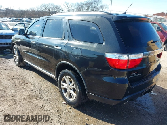 2013 Dodge Durango Crew with VIN 1C4SDHDT3DC553939, listed as a IAAI auction lot 41404491 with 148,505 mi miles and . Bid and sale history available at carsss.com. Image 3.