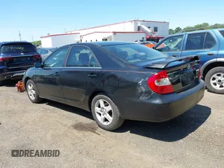 2002 Toyota Camry LE z VIN JTDBE32K020095947, wystawiony jako IAAI lot #42364984 z przebiegiem 198 756 mil mil oraz . Historia ofert i sprzedaży dostępna na DreamBid. Obrazek 3.
