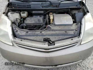 2005 Toyota Prius z VIN JTDKB20U053070122, wystawiony jako Copart lot #86879114 z przebiegiem Nie podano mil oraz Szkoda całkowita • Salvage title. Historia ofert i sprzedaży dostępna na DreamBid. Obrazek 11.