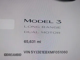 2021 Tesla Model 3 Long Range with VIN 5YJ3E1EBXMF051060, listed as a IAAI auction lot 41958018 with 65,631 mi miles. Bid and sale history available at carsss.com. Image 15.