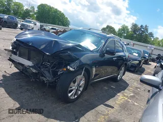 2015 Infiniti QX70 z VIN JN8CS1MW9FM483358, wystawiony jako IAAI lot #42194570 z przebiegiem 86 168 mil mil oraz . Historia ofert i sprzedaży dostępna na DreamBid. Obrazek 17.