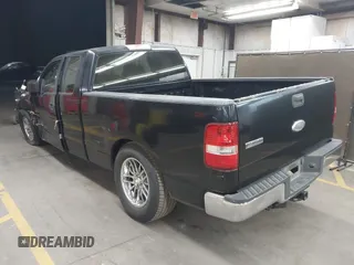 2006 Ford F-150 STX with VIN 1FTRX12W96NB42417, listed as a IAAI auction lot 41910493 with 220,559 mi miles. Bid and sale history available at carsss.com. Image 3.