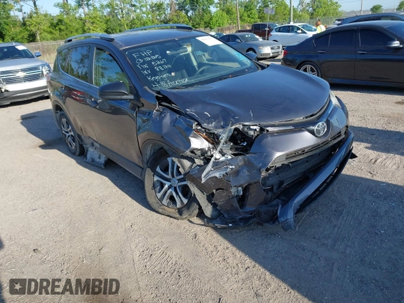 2016 Toyota RAV4 LE with VIN JTMZFREV7GJ065267, listed as a IAAI auction lot 42011267 with 180,127 mi miles. Bid and sale history available at carsss.com. Image 1.