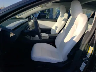 2024 Tesla Model 3 with VIN 5YJ3E1EA2RF859983, listed as a Copart auction lot 48044865 with 2,277 mi miles and Salvage Title. Bid and sale history available at DreamBid. Image 7.
