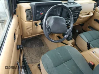 1998 Jeep Wrangler Sahara with VIN 1J4FY49S2WP707318, listed as a Copart auction lot 59508635 with 144,948 mi miles and Clean title. Bid and sale history available at DreamBid. Image 8.