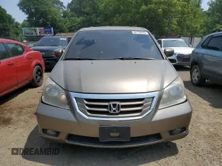 2008 Honda Odyssey Touring z VIN 5FNRL38968B025520, wystawiony jako Copart lot #60799645 z przebiegiem 116 592 mil mil oraz Szkoda całkowita • Salvage title. Historia ofert i sprzedaży dostępna na DreamBid. Obrazek 5.