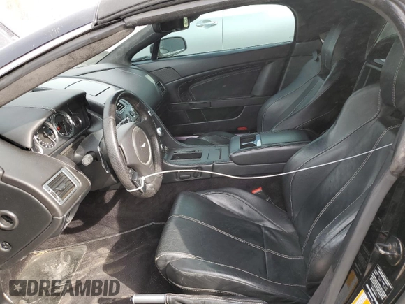2009 Aston Martin Vantage z VIN SCFBF04CX9GD11942, wystawiony jako Copart lot #43771214 z przebiegiem 52 730 mil mil oraz . Historia ofert i sprzedaży dostępna na DreamBid. Obrazek 7.