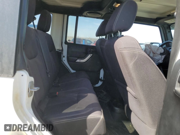 2014 Jeep Wrangler Unlimited Sahara with VIN 1C4BJWEG5EL111115, listed as a Copart auction lot 48385295 with 140,652 mi miles and Salvage Title. Bid and sale history available at carsss.com. Image 11.