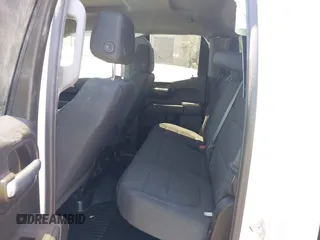 2021 Chevrolet Silverado 1500 Work Truck with VIN 1GCRWAEF9MZ122334, listed as a IAAI auction lot 39596264 with 27,876 mi miles and . Bid and sale history available at DreamBid. Image 8.