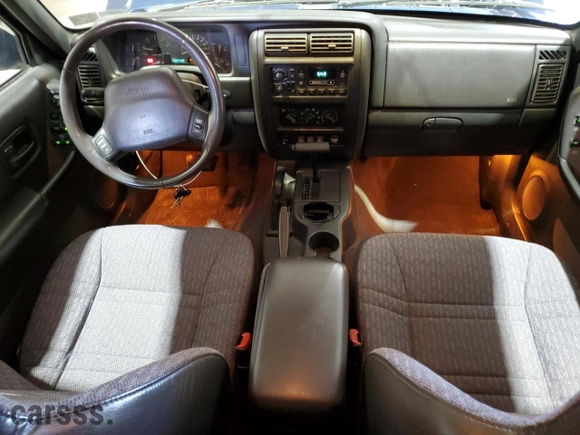 2000 Jeep Cherokee Police with VIN 1J4FF48S4YL121981, listed as a Copart auction lot 49983465 with NaN miles and Salvage Title. Bid and sale history available at carsss.com. Image 8.