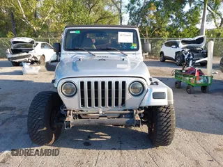 2005 Jeep Wrangler Unlimited with VIN 1J4FA44S65P335444, listed as a IAAI auction lot 41731093 with 143,918 mi miles. Bid and sale history available at carsss.com. Image 12.