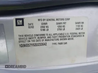 2002 Cadillac DeVille DHS z VIN 1G6KE57Y62U233642, wystawiony jako IAAI lot #42132517 z przebiegiem 223 505 mil mil oraz . Historia ofert i sprzedaży dostępna na DreamBid. Obrazek 9.